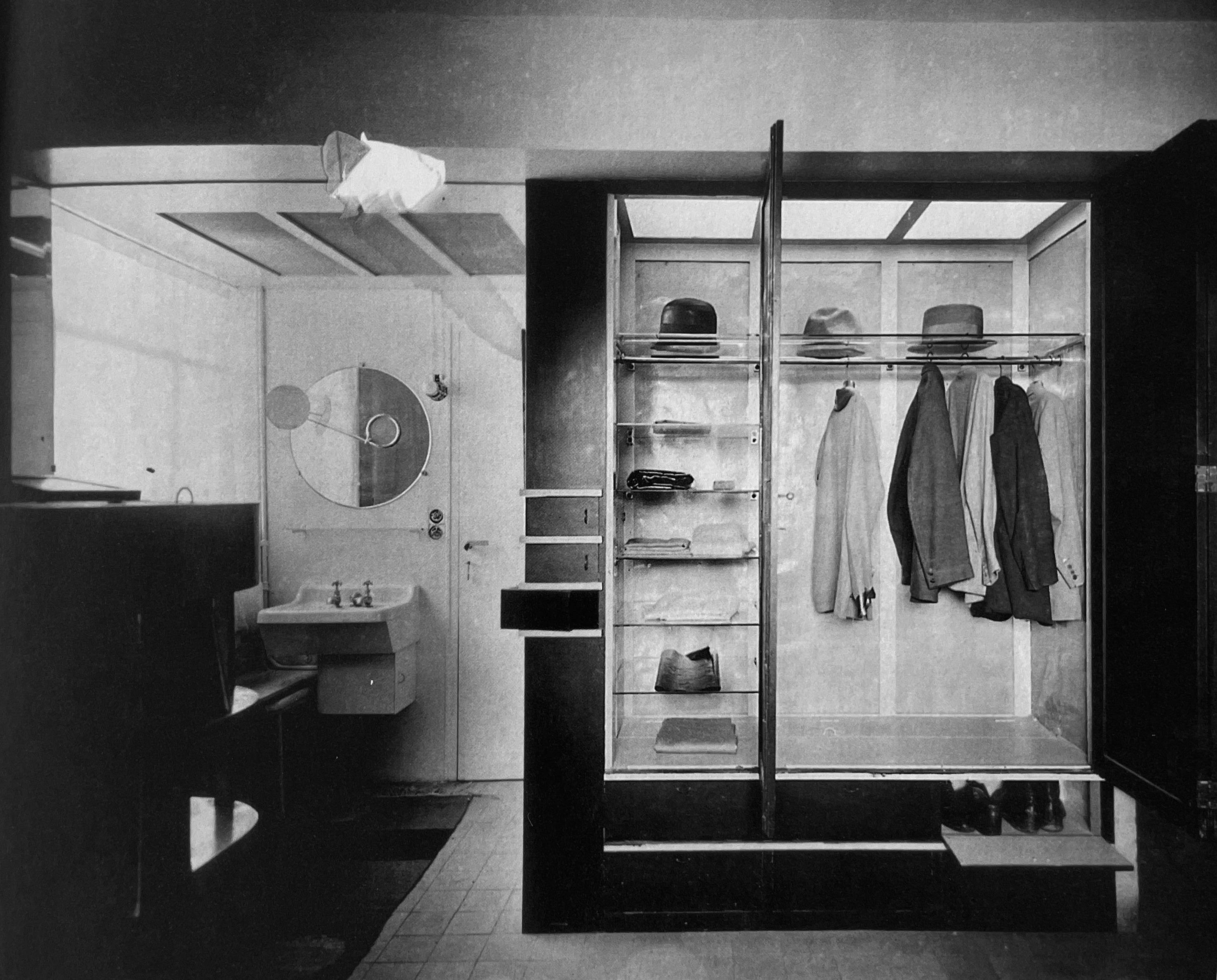 Eileen Gray — Gentleman's dressing room, built-in wardrobe and vanity
in lacquered wood, c. 1932