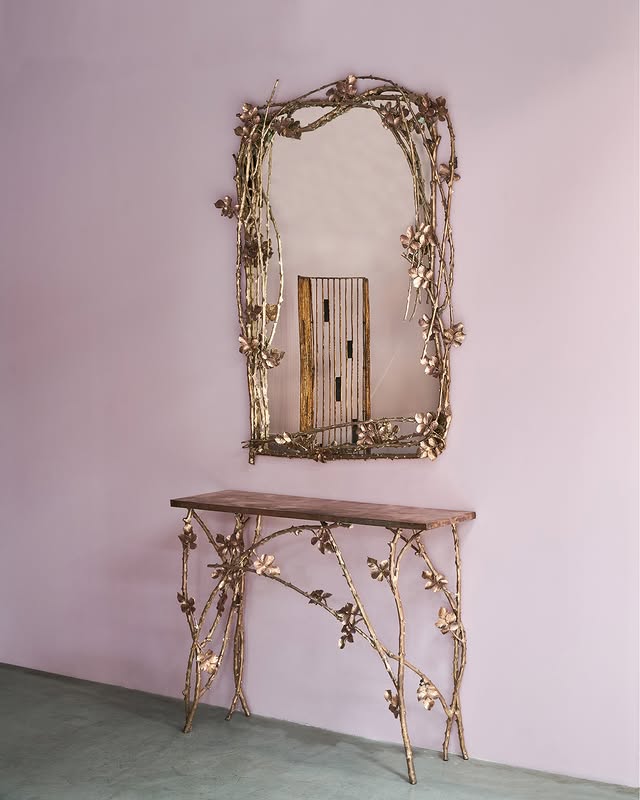 Bronze looking glass. ⁠